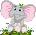 Cute elephant cartoon sitting in garden Royalty Free Stock Photo