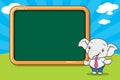 Cute elephant mascot teacher with blank board Royalty Free Stock Photo