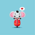 Cute elephant riding classic motorbike