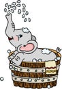 Cute elephant taking a bath in wooden tub