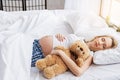 Cute expectant mother having nap Royalty Free Stock Photo