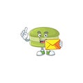 Cute face coconut macarons mascot design holding an envelope