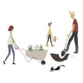 Cute family doing farm work. Woman with wheelbarrow, man working with shovel, boy with watering can, cat. Royalty Free Stock Photo