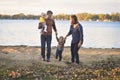 Cute Family by Lake Royalty Free Stock Photo