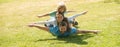 Cute family portrait. Mother father and child son having fun outdoors at summer park. Banner panorama with copy space Royalty Free Stock Photo