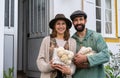 Cute farmer couple holding blocks of lion mane mushrooms