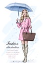 Cute fashion girl with umbrella. Stylish beautiful woman in fashion clothes. Hand drawn fashion model. Sketch. Royalty Free Stock Photo