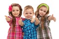 Cute fashion kids showing thumbs up