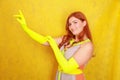 Cute fashion lady with long satin fashion yellow gloves