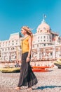 Cute fashionable blonde on the beach in Nice