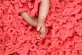 Cute feet of newborn baby on the blanket. The concept of love, health and care Royalty Free Stock Photo