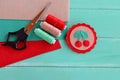 Cute felt brooch with red cherries and green leaves. Crafts supplies and tool. Beautiful summer accessory for girls and women Royalty Free Stock Photo