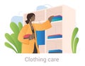 Cute female character is sorting and putting clothes in order in closet on white background