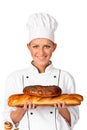 Cute female Chef baker or cook holding up a beautiful loaf Brea