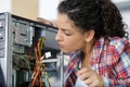 Cute female engineer at home working on technology Royalty Free Stock Photo