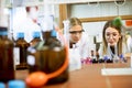 Female researchers in white lab coat working in the laboratory