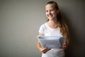 Cute female university/highschool student with books Royalty Free Stock Photo