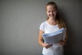 Cute female university/highschool student in front of a blackboard Royalty Free Stock Photo