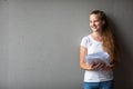 Cute female university/highschool student in front of a blackboard Royalty Free Stock Photo