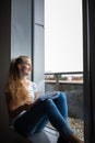 Cute female university/highschool student in library Royalty Free Stock Photo