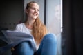 Cute female university/highschool student in library Royalty Free Stock Photo