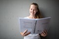 Cute female university/highschool student in front of a blackboard Royalty Free Stock Photo