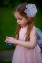 Cute five year old girl in a pink princess dress. portrait of a happy cute blonde girl 5 years old Royalty Free Stock Photo