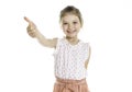 cute five year old girl with thumb up on isolated white. Royalty Free Stock Photo