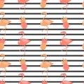 Cute flamingos and pineapples on black stripes background seamless vector pattern illustration