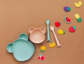Cute Flat lay composition with baby accessories and tableware for food