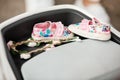 Cute floral baby girl shoes. Stylish baby shoes and baby hair decoration in flowers. Childhood. selective focus