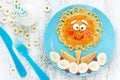 Cute flower pancakes with banana for kids breakfast. Good morning concept Royalty Free Stock Photo