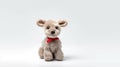 Cute fluffy vintage toy with a red bow on white background. Christmas gift for Royalty Free Stock Photo