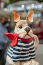 Cute French Bulldog. Ceramic figurine, dog breed. Statuette dogs French bulldog on the shelf Royalty Free Stock Photo