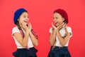 They are really cute. French style girls. Girls having the same hairstyle. Small children with long hair plaits. Fashion