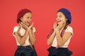 They are really cute. French style girls. Girls having the same hairstyle. Small children with long hair plaits. Fashion