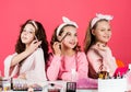 They are really cute. friendship party with cosmetic. relax and having fun. small girls in beauty salon. little sisters