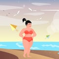 Cute full-figured woman on the beach