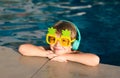 Cute fun kid face of little boy in funny sunglasses in pool in sunny day. Royalty Free Stock Photo