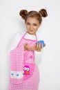 Cute funny girl with slime in the kitchen. The girl cooks and bakes her muffins, makes a cake and slime. Royalty Free Stock Photo