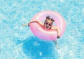 Cute and funny girl in swimming pool