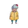 Cute funny grandmother with grey hair and yellow coat