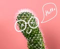 Funny greeting card cactus with drawn face with glasses saying hello