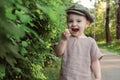 Cute funny playful toddler boy enjoying summer. Royalty Free Stock Photo