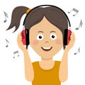 Cute teenager girl listening to music with headphones