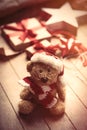 Cute gifts, star shaped toy, teddy bear in santa claus hat and t Royalty Free Stock Photo