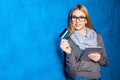 Cute girl against blue wall Royalty Free Stock Photo