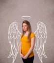 Cute girl with angel illustrated wings Royalty Free Stock Photo
