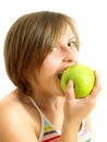 Cute girl biting a green apple Royalty Free Stock Photo