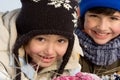 Cute girl and boy winter portrait